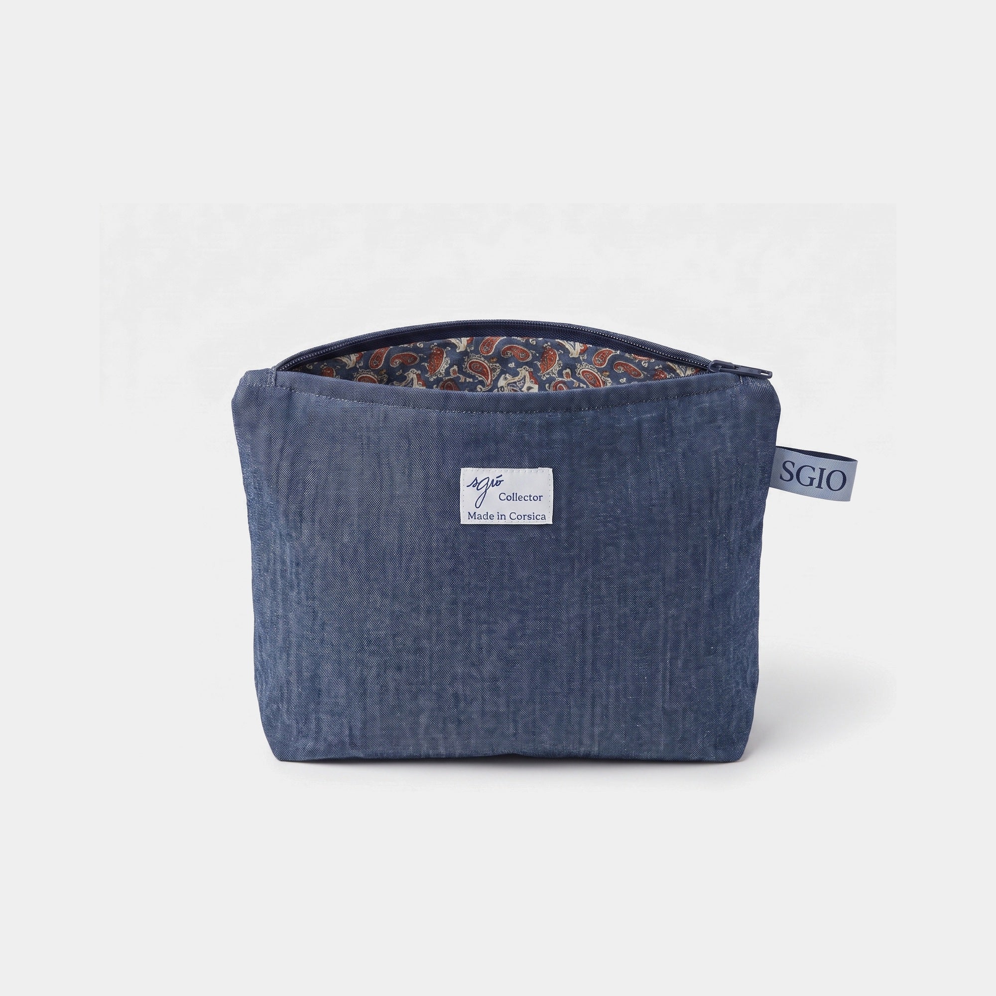 Pochette en denim doublée paisley, fermeture ouverte, étiquette sgiò Collector